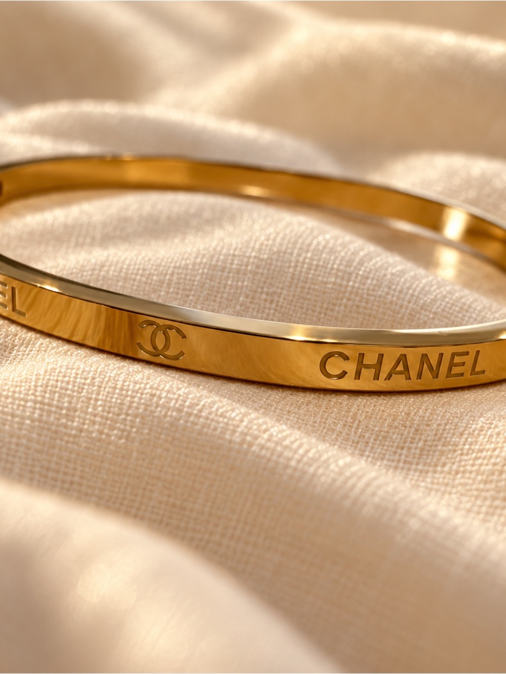 Gold-Tone Engraved Logo Bangle Bracelet